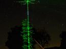 Laser illumination of the hex beam as it posed for this nighttime photo.